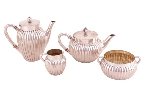 Lot 275 - A German matched bachelor's four-piece tea set,...