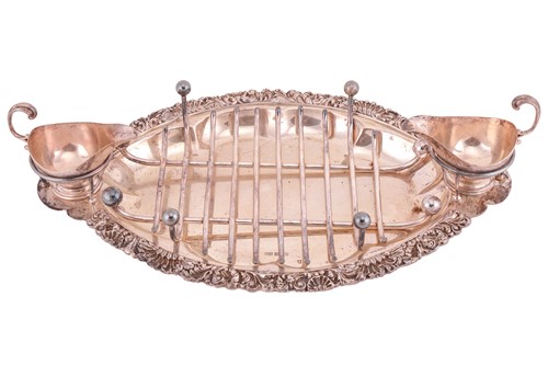 Lot 281 - An Edwardian silver asparagus serving tray...