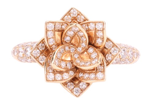 Lot 138 - A diamond-set floral ring in 18ct yellow gold,...