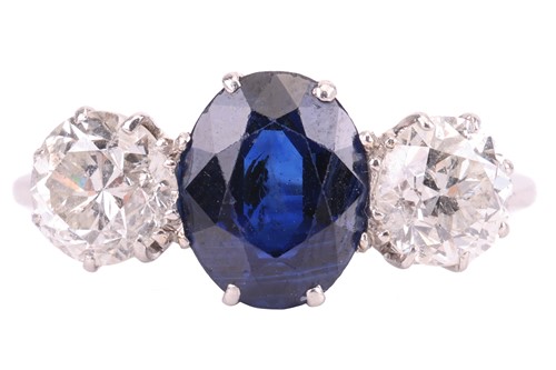 Lot 147 - A sapphire and diamond trilogy ring,...