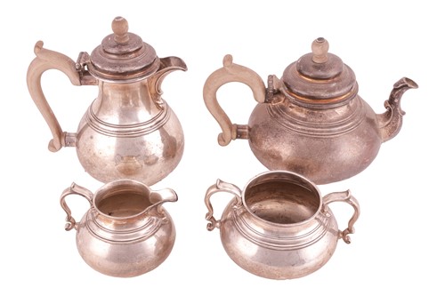 Lot 280 - Asprey & Co Ltd - A silver four-piece tea...