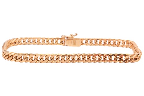 Lot 133 - A curb link bracelet in 18ct yellow gold,...