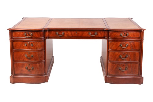 Lot 112 - A George III-style mahogany kneehole partner's...