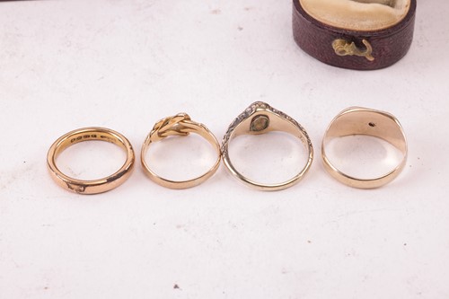 Lot 161 - A collection of four rings, to include a 22ct...