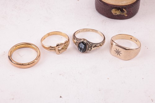 Lot 161 - A collection of four rings, to include a 22ct...