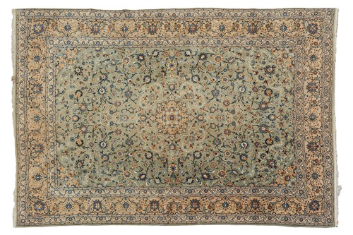 Lot 180 - A pale blue ground room-size Kashan carpet,...