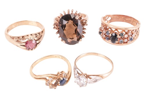 Lot 49 - Five gem-set rings; comprising a smoky quartz...
