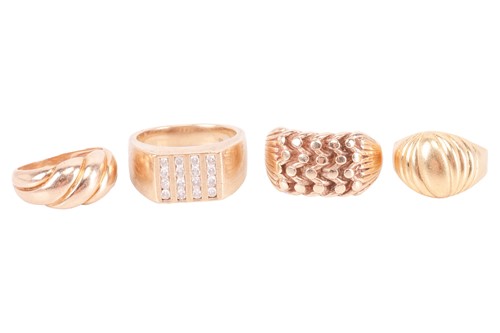 Lot 2 - A collection of four rings; comprising a 9ct...