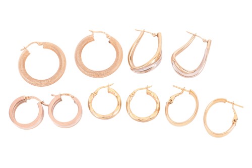 Lot 3 - A collection of five pairs of hoop earrings;...