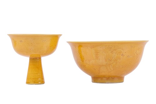 Lot 74 - A Chinese Yellow glazed porcelain stem cup,...