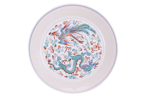 Lot 159 - A Chinese Wucai porcelain circular "Dragon &...