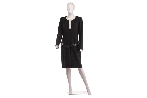 Lot 111 - Chanel - a black belted wool dress, from 2009...