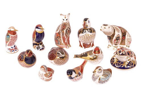 Lot 246 - A collection of Royal Crown Derby paperweights,...