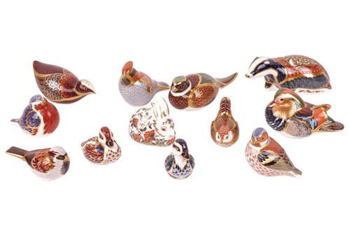 Lot 263 - A collection of Royal Crown Derby paperweights,...