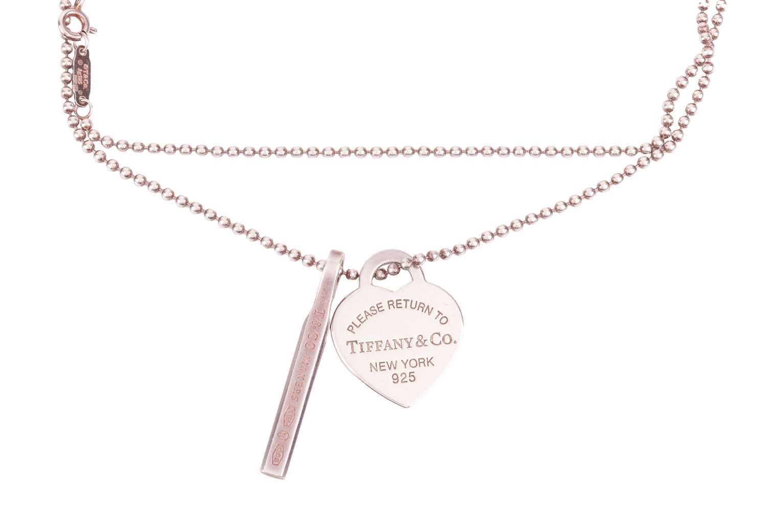Lot 30 - Tiffany & Co. - a '1837 makers' bar pendant...