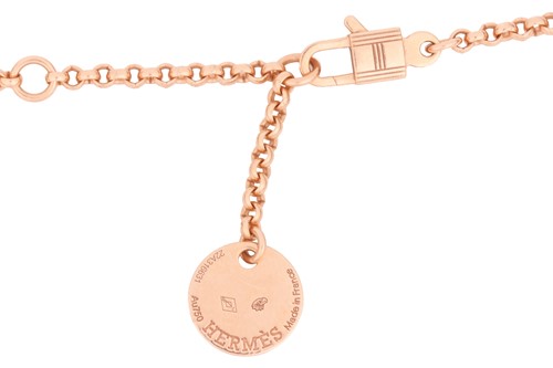 Lot 66 - Hermès - a 'Kelly Clochette' necklace, small...