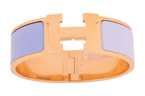 Lot 34 - Hermès - A wide 'Clic H' bracelet with 'blue...