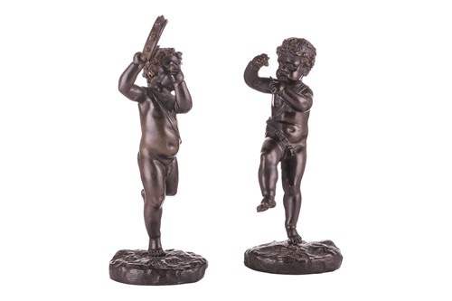 Lot 316 - A pair of patinated bronze figures of children...