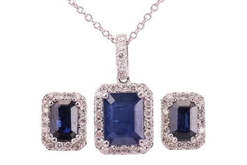 Lot 161 - A sapphire and diamond-set pendant and earring...