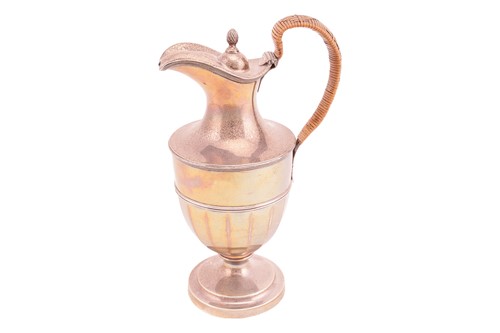 Lot 306 - An Edwardian silver hot water pedestal ewer,...