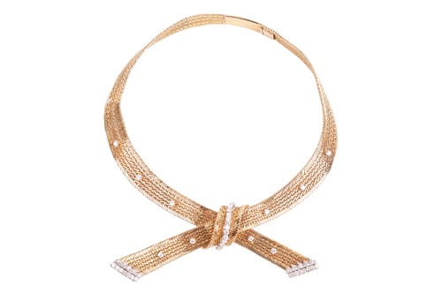 Lot 171 - Kutchinsky - a diamond-set bow necklace, set...