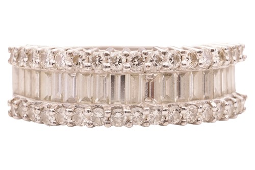 Lot 136 - A diamond half eternity ring, comprising two...