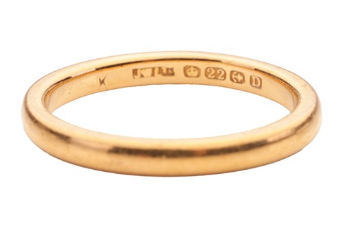 Lot 37 - A 22ct gold wedding band, the court-shaped...
