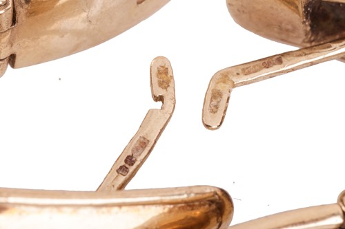 Lot 13 - A pair of curved hoop earrings, set in 9ct...