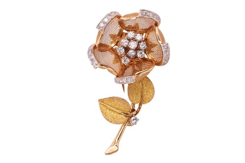 Lot 146 - A diamond flower brooch, French circa 1960s,...