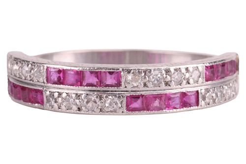 Lot 124 - An Art Deco diamond and synthetic ruby half...