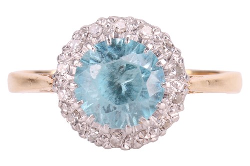 Lot 86 - A zircon and diamond halo ring centred with a...