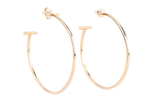 Lot 112 - Tiffany & Co. - a pair of Tiffany T wire hoop...