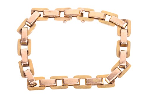 Lot A bi-coloured rectangular link bracelet; the...