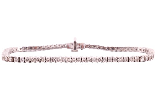 Lot 71 - A diamond line bracelet, comprising eighty-one...