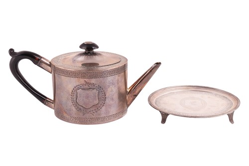Lot 109 - A matched George III silver oval teapot and...