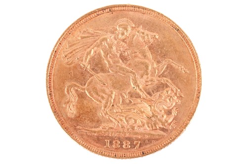 Lot 71 - A Victorian 1887 sovereign, St George and the...