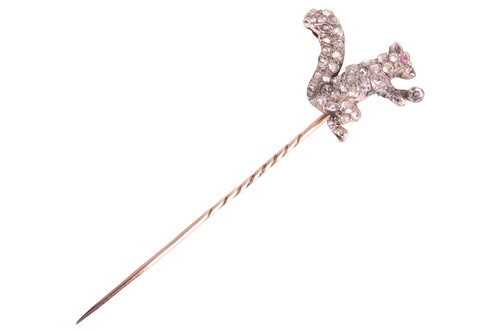 Lot 89 - A diamond-set stick pin modelled as a squatted...