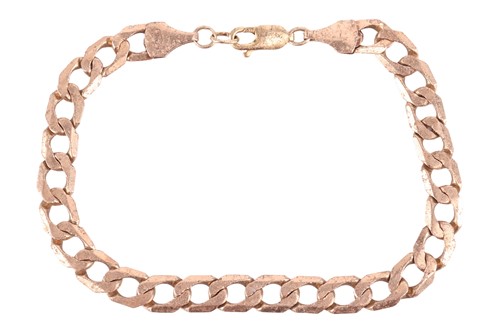 Lot 113 - A flat curb link bracelet in 9ct gold,...