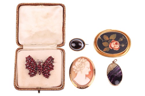 Lot 130 - Five gem-set brooches; consisting of a shell...