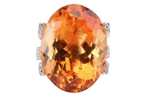 Lot A large citrine and diamond cocktail ring,...