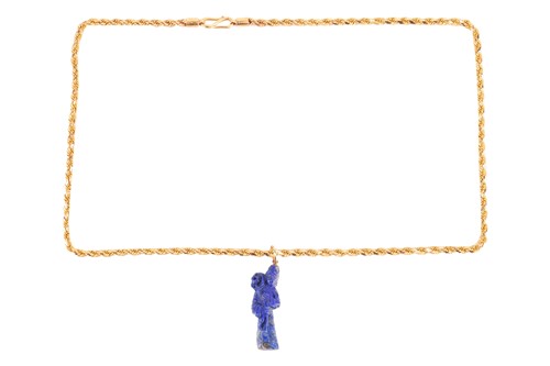 Lot 36 - A lapis lazuli Guanyin pendant on a 22ct gold...