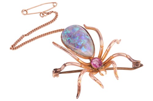 Lot 139 - A spider brooch set with dark opal and pink...