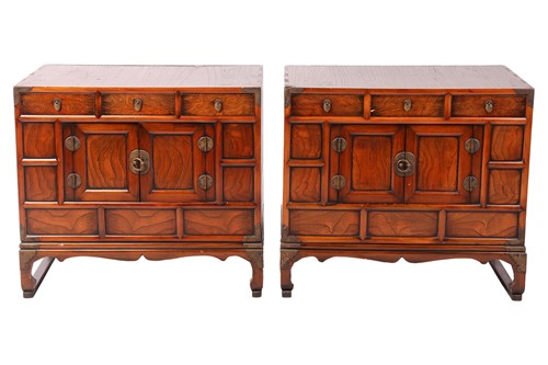 Lot 104 - A pair of early 20th-century Korean elm coffer...