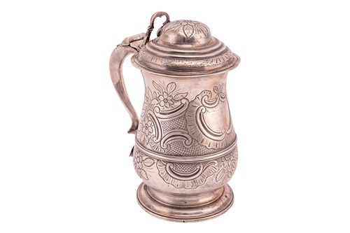 Lot 301 - A George III silver tankard, of baluster form...