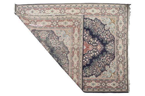Lot 296 - A large Turkish woollen "Ladik" carpet with...