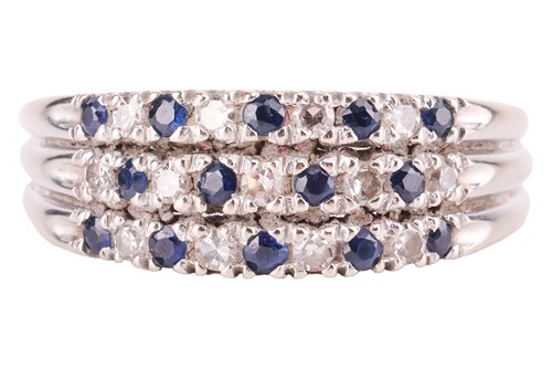 Lot 135 - A three-row sapphire and diamond ring,...