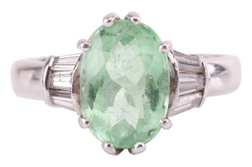 Lot 37 - A tourmaline and diamond dress ring, centred...