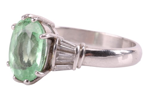 Lot 37 - A tourmaline and diamond dress ring, centred...