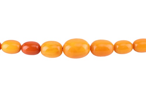 Lot 10 - Two beaded necklaces; to include a...