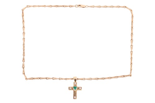 Lot 219 - An emerald and diamond cross pendant on chain,...